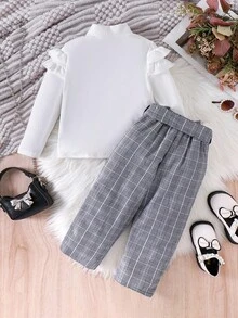 SHEIN 2pcs Young Girls Knitted Ivory Stand Collar Long Sleeve Frill Trim Rose Button Blouse & Plaid Khaki Pants Set, Elegant Commuter Fashion Outfit For Autumn/Winter Girls Plaid Set Girls Checkered Outfit Two Pieces Kids Set Plaid Girl Plaid Pants Set Toddler Girl Plaid Outfit - Grey - View 2