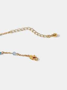 Rick and Morty X SHEIN Collar dorado con cuentas con personaje de dibujos animados y nave espacial