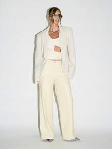 KIZN Pantalones palazzo de patas anchas de piel sintética en color crema, de tiro alto con bolsillos laterales, perfectos para uso formal, profesional y de noche en otoño e invierno - Amarillo - Ver 4