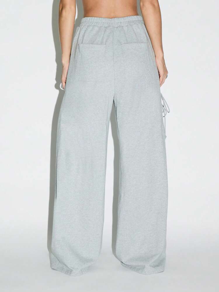 KIZN Joggers de pierna ancha con detalle de cordones laterales