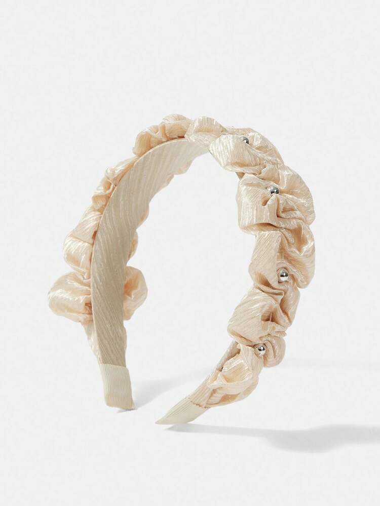 Bandeau plissé avec décoration de perles