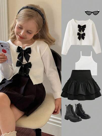 SHEIN Cárdigan con lazo para niña con cuello redondo, informal para uso diario, otoño/invierno, tops de manga larga, elegante y lindo, de alta calidad, cálido y suave, versátil para jugar, uso diario, escuela, otoño e invierno, combinado con camisa blanca, temporada de regreso a clases, estilo universitario