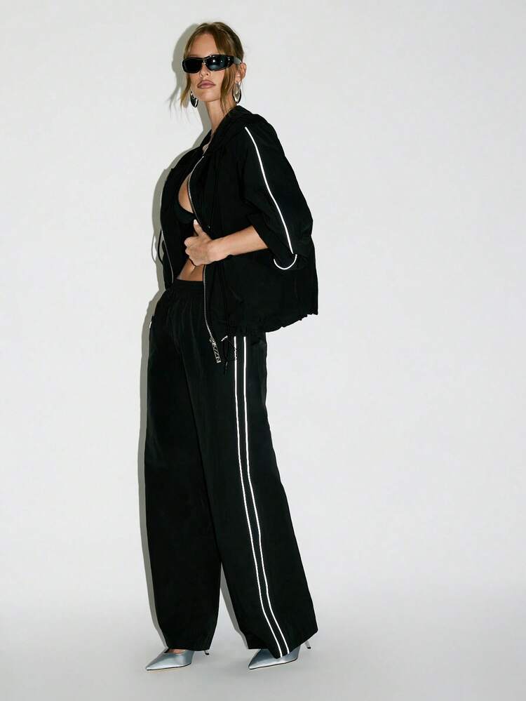 KIZN Veste de survêtement coupe-vent avec bandes latérales réfléchissantes