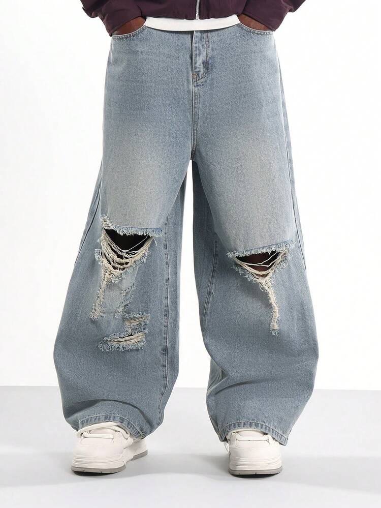 Wide Leg Distressed Denim With Raw Hem