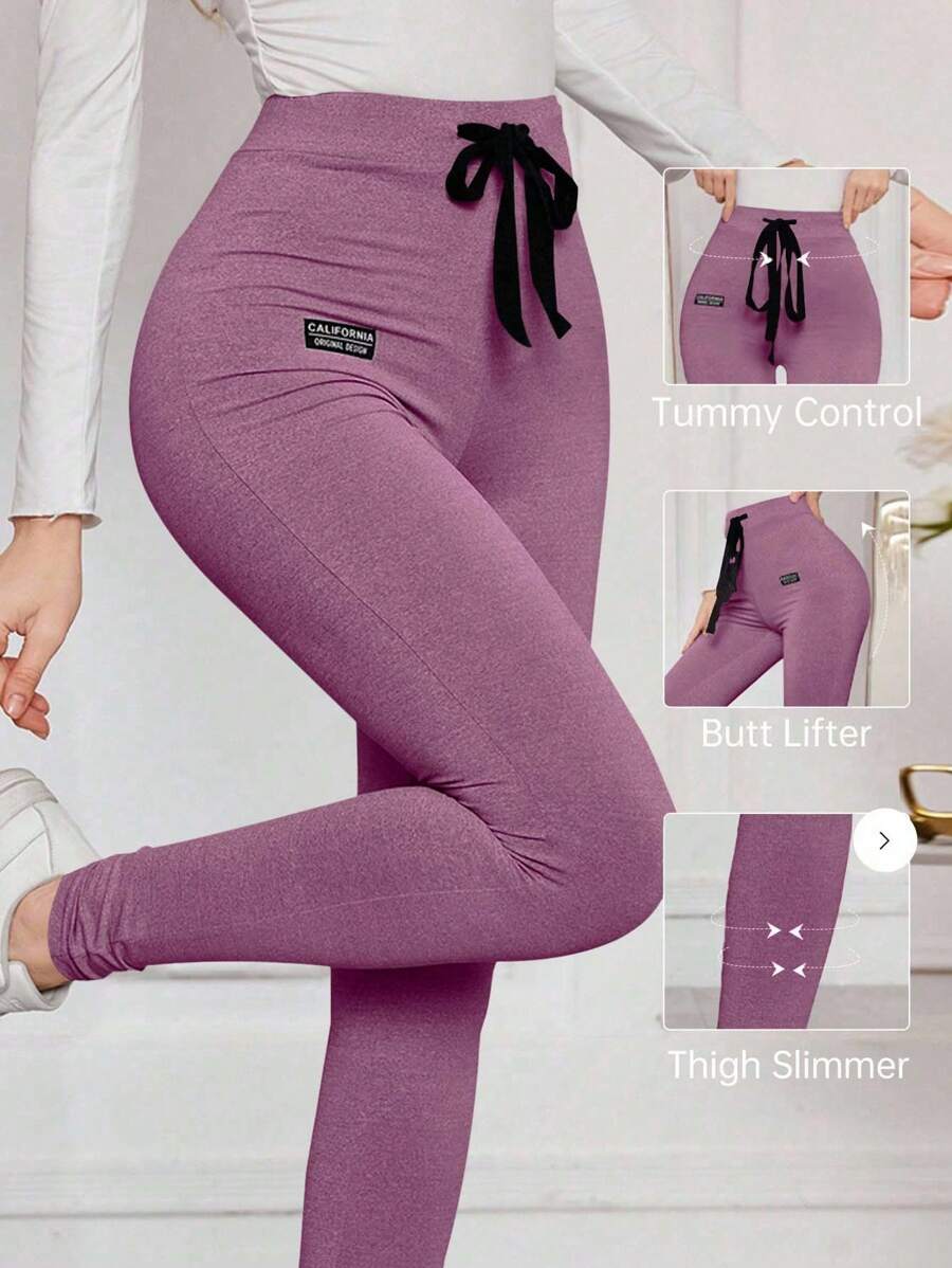 Modelyn Quần legging bó sát có dây rút màu trơn dành cho nữ, thoải mái và co giãn - Màu tím  Violet - Xem 1