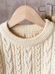 SHEIN 2 piezas Conjunto de suéter casual de cuello redondo de unicolor y pantalones de corte holgado para niña joven