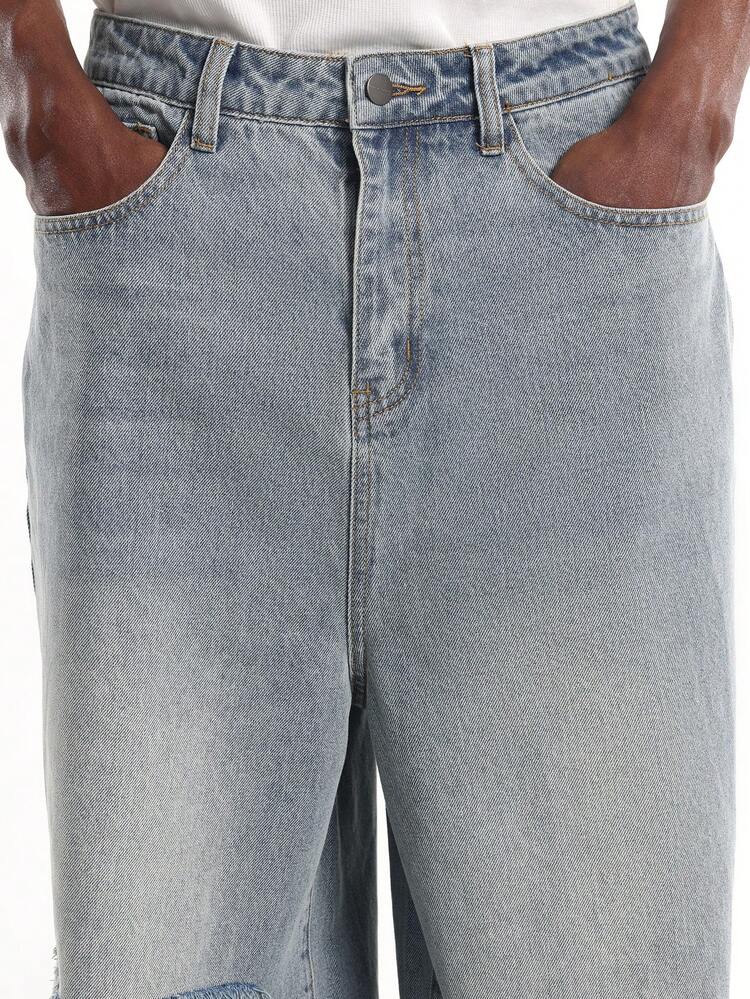 Wide Leg Distressed Denim With Raw Hem