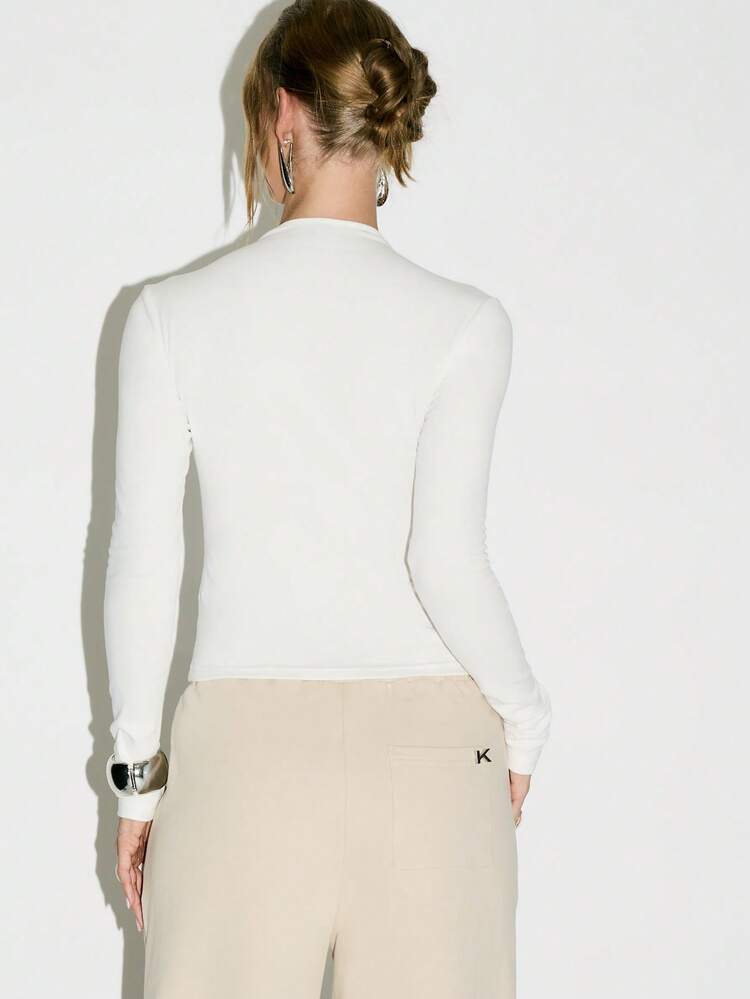 KIZN Mandarin Collar Quarter Zip Fitted Crop Top