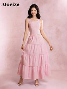 青少年（女孩）两件套服装，春夏休闲优雅，包括粉色无袖蝴蝶结吊带衫和粉色长裙