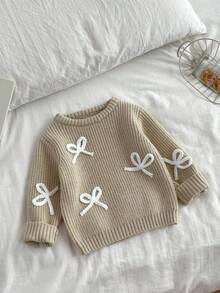 SHEIN Vintaside Kids 時尚百搭可愛蝴蝶結針織套頭毛衣，適合年輕女孩，秋季、仙女風、學校、返校季，淺棕色秋冬服飾 - 杏色 - 查看 1
