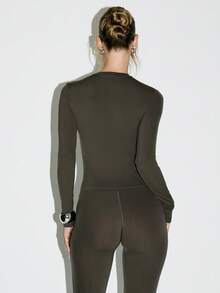 KIZN Long Sleeve Form Fitting Bodysuit Mock Neck Design With Metallic Logo Detail Stretch Jersey Fabric Classic Fall Winter Essential Fashion Basic Top Sheer Slinky Material - Coffee Brown - View 2