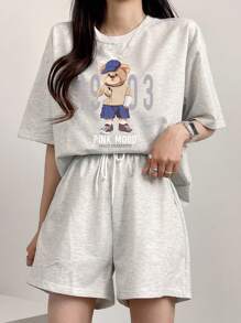 DAZY Conjunto deportivo de 2 piezas con camiseta de cuello redondo holgada y estampado de dibujos animados, y pantalones cortos, informal para primavera/verano, conjuntos de ropa de estar en casa para mujer - Gris - Ver 4