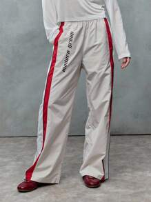 TypaGal These Wide-Leg Track Pants Bring Throwback Energy. With Bold Red Stripes And Print, They're Perfect For 2000s-Style Fall. - Multicolor - View 3
