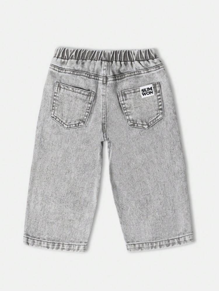 Pantalones vaqueros holgados lavados con ácido y perneras anchas