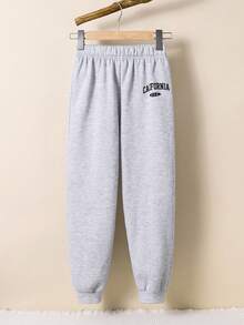 Spodnie dresowe dla nastolatek, codzienne, uniwersalne, wygodne, z nadrukiem, z luźnym ściągaczem w pasie i jednolitym kolorem, dzianinowe, odpowiednie do dojazdów do pracy, szkoły, na co dzień, na wakacje, do sportu, na wiosnę/lato/jesień/zimę