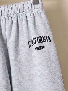 Spodnie dresowe dla nastolatek, codzienne, uniwersalne, wygodne, z nadrukiem, z luźnym ściągaczem w pasie i jednolitym kolorem, dzianinowe, odpowiednie do dojazdów do pracy, szkoły, na co dzień, na wakacje, do sportu, na wiosnę/lato/jesień/zimę