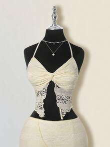 SHEIN ICON Conjunto de verano y primavera para mujer con falda asimétrica de cintura baja con volantes y top halter de cuello anudado de encaje jacquard texturizado en estilo bohemio retro y sexy en color albaricoque - Albaricoque - Ver 3