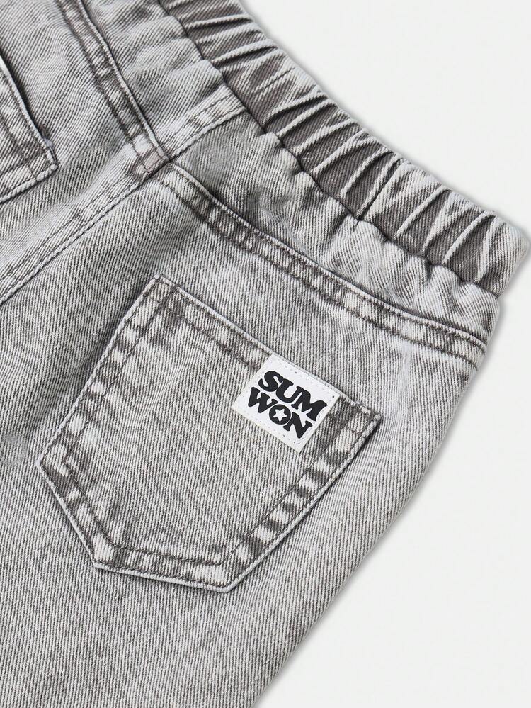 Pantalones vaqueros holgados lavados con ácido y perneras anchas