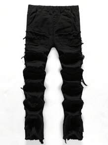 SHEIN Bolty休闲街头风男童牛仔裤，适合日常穿着，黑色破洞牛仔裤，适合秋冬季男童穿着。