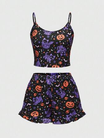 Goth Conjunto de pijama de camiseta y pantalones cortos con decoración de esqueleto de gato, calabaza, estrella, luna y hueso de estilo gótico de Halloween