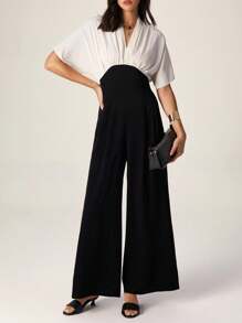 Modelyn Fashionable New Simple Color Block Women Batwing Sleeve Jumpsuit - Black - View 1