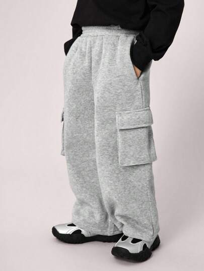 Spodnie dresowe dla dzieci i młodzieży, luźne, proste, w kolorze moro, w kolorze szarym, idealne na powrót do szkoły, na wakacje, w podróż, do uprawiania sportu w sezonie jesienno-zimowym