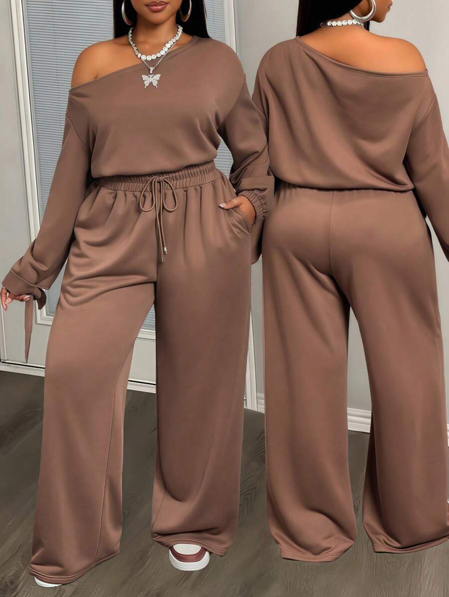 Slaydiva Ensemble 2 pièces ample à manches longues avec une épaule inclinée, un Top avec cordon élastique à la taille et poches, et un pantalon à jambes larges. Couleur brun foncé. Convient pour l'automne/hiver, le retour à l'école, le style de rue, les sorties, le travail, l'aéroport, les fêtes, le quotidien, etc.