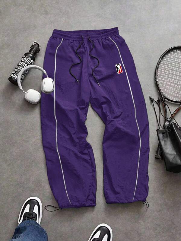 Manfinity Sport Corelite Pantalones jogger de cintura con cordón, ajuste holgado, pantalones casuales para hacer ejercicio para hombres