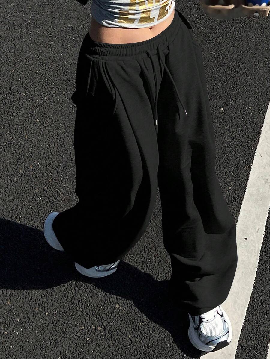 DAZY 女款素色寬鬆百褶長褲 運動休閒街頭風 刷毛加厚保暖運動褲 秋冬款 - 黑色 - 查看 1
