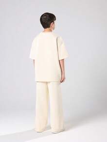 SUMWON Cozy Chicago Collection Two Piece Outfit Matching Unisex Kids Wear Set With Relaxed T Shirt And Wide Leg Pants For Autumn Winter Wear - Apricot - View 2
