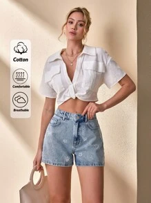 CLARA VERO Short de mezclilla mini con detalle de rhinestones a la cintura media