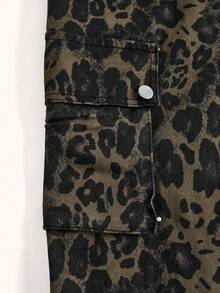 TypaGal These Wide-Leg Camo Print Overalls Add Wild Energy To Any Outfit. Layered Over A Sheer Hoodie, They Mix Utility And Attitude With Ease.