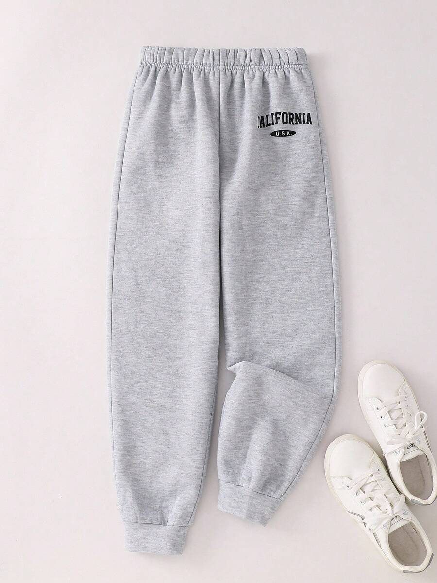 Spodnie dresowe dla nastolatek, codzienne, uniwersalne, wygodne, z nadrukiem, z luźnym ściągaczem w pasie i jednolitym kolorem, dzianinowe, odpowiednie do dojazdów do pracy, szkoły, na co dzień, na wakacje, do sportu, na wiosnę/lato/jesień/zimę