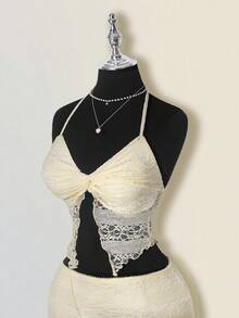 SHEIN ICON Conjunto de verano y primavera para mujer con falda asimétrica de cintura baja con volantes y top halter de cuello anudado de encaje jacquard texturizado en estilo bohemio retro y sexy en color albaricoque - Albaricoque - Ver 6