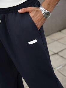 Manfinity Homme Pantalon casual ample à jambe droite avec taille à cordon et poches, pour l'automne, tailles plus pour hommes - Bleu marine - Voir 3