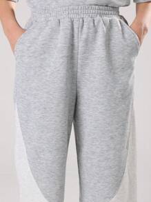 SUMWON Ensemble deux pièces pour pré-adolescents, Sweat-shirt-shirt gris chiné et jogging à larges jambes avec bloc de couleurs et imprimé logo orange. Tenue d'automne et d'hiver