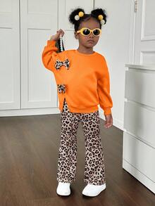 SHEIN Bộ 2 áo len cổ tròn in họa tiết da báo 3D màu trơn và quần len in họa tiết da báo cho bé gái - trái cam - Xem 4