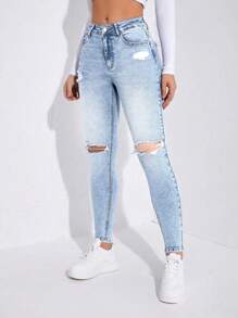 破洞紧身牛仔裤