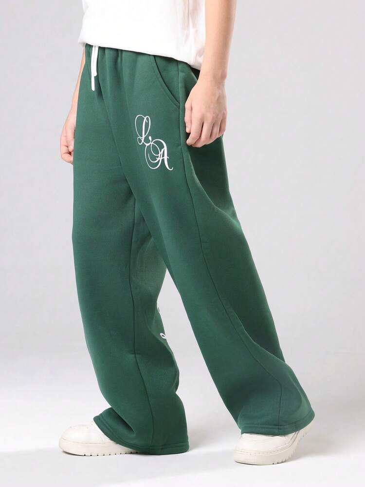 Pantaloni della tuta a gamba larga con tasche laterali e stampa scritta