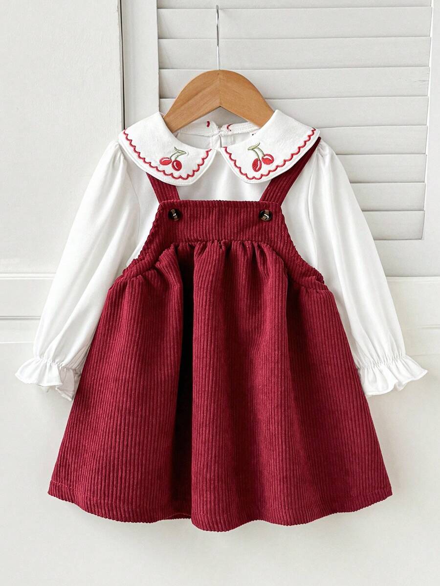 SHEIN 1pc Girls' French Retro Cherry Embroidery Pinafore Dress + Long Sleeve Shirt Underlay, Suitable For Daily Wear And Photography, Autumn Burgundy Dress For Baby Girl Baby Girl Christmas Outfit Cherry Toddler Outfit Corduroy Jumper Dress Baby Girl Toddler Corduroy Dress - Red - View 1