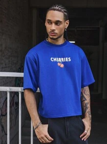 PAVTROS Manfinity Streetrush Herren Vintage Kirschprint T-Shirt, Strick Rundhals Tee, locker geschnittener Crop Fit, lustiges Kirsch Grafik Design, geeignet für Lässig, Streetwear, Training, Schulanfang, Mode, Geschenk, Freund Geschenk, Unisex