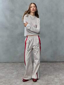 TypaGal These Wide-Leg Track Pants Bring Throwback Energy. With Bold Red Stripes And Print, They're Perfect For 2000s-Style Fall. - Multicolor - View 7