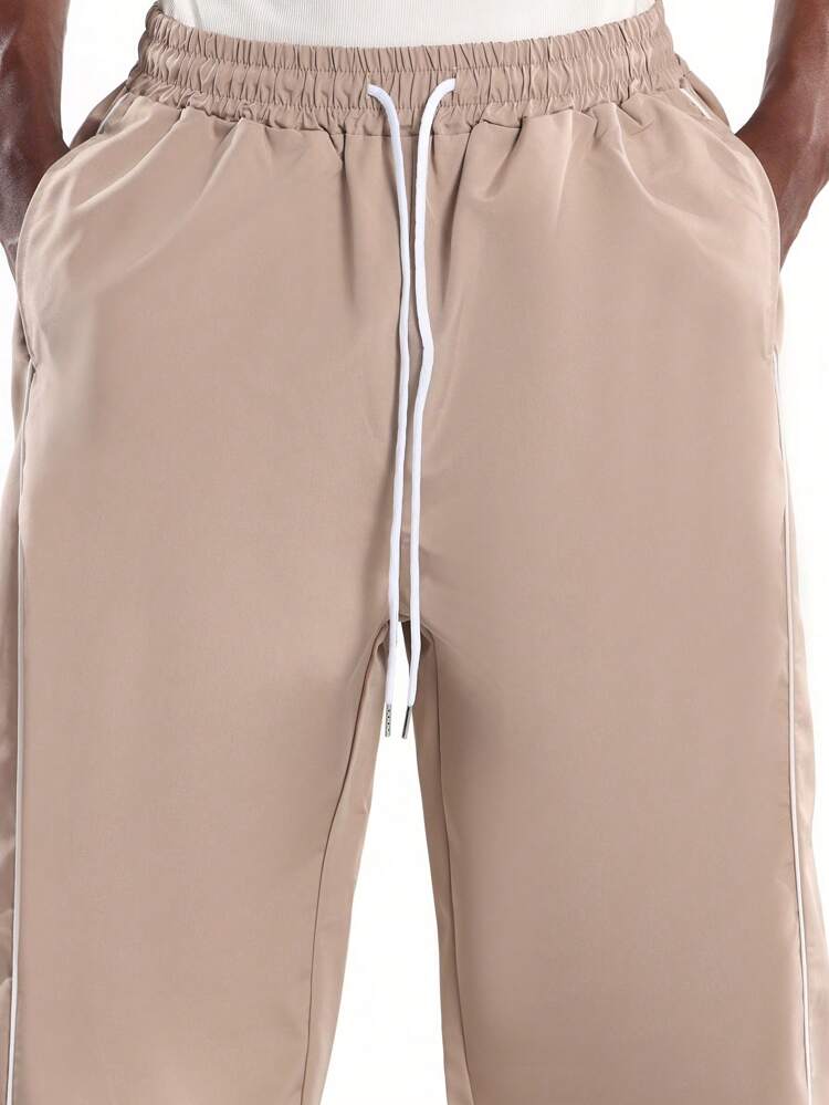 Loose Track Style Pants With Side Piping Detail