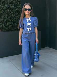 SHEIN Tween Girls Spring Summer Casual Versatile Fashion Round Neck Ruffle Sleeve Button Up Bowknot Top And Baggy Loose Fit Wide Leg Jeans Pants Set,Summer Concert Festival Casual Rave Outfits, Girls Summer Brunch Church Graduation Outfits,Streetwear Back To School Two Pieces Outfits, Blue Two Piece Set, Kids Blue Wide Leg Pants Set, Girls Blue Outfit Set, Girls Bow Top And Pants Set, Tween Girl Two Piece Outfit - Dark Wash - View 1