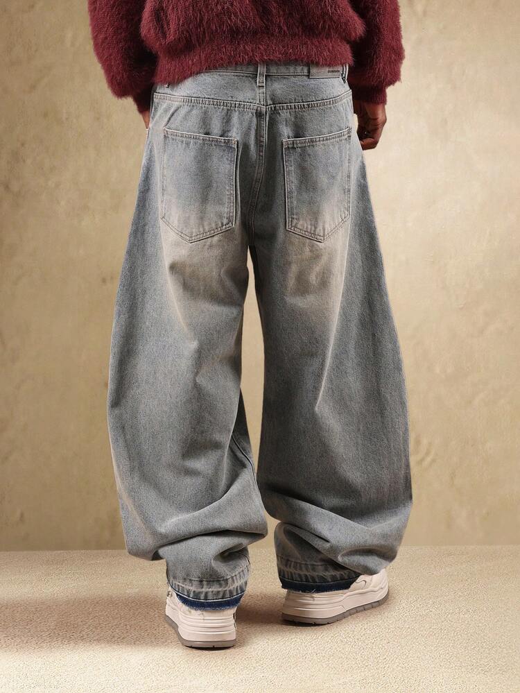 Spodnie z szerokimi nogawkami w kolorze jasnoszarym, z denimu z surowym obszyciem