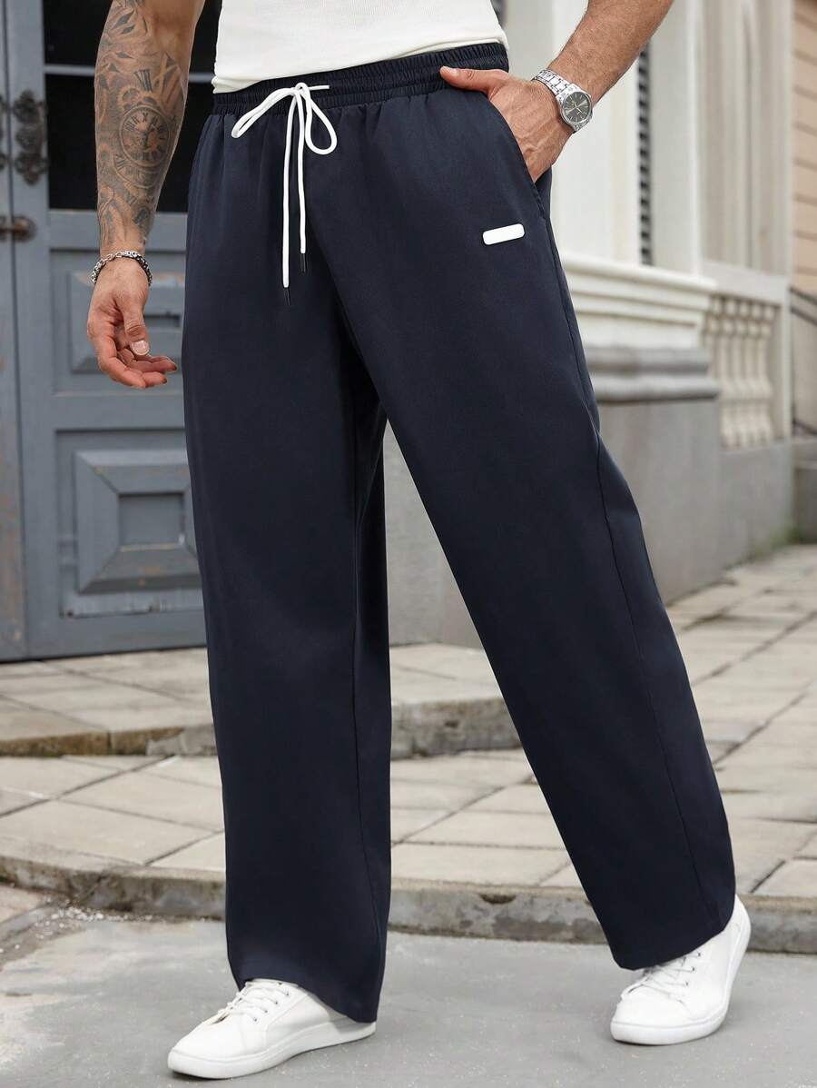 Manfinity Homme Pantalon casual ample à jambe droite avec taille à cordon et poches, pour l'automne, tailles plus pour hommes - Bleu marine - Voir 1