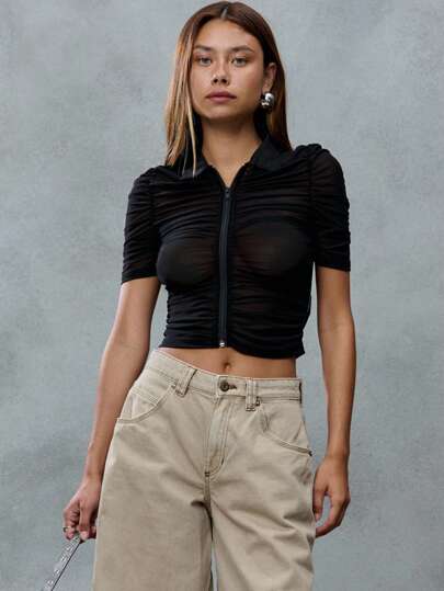 TypaGal Black Ruched Mesh Zip-Up Polo Top With Short Sleeves. Channeling A Grungy Punk Vibe, It's A Bold Back To School Pick With A 2000s Flair. Great Layered Or Solo.