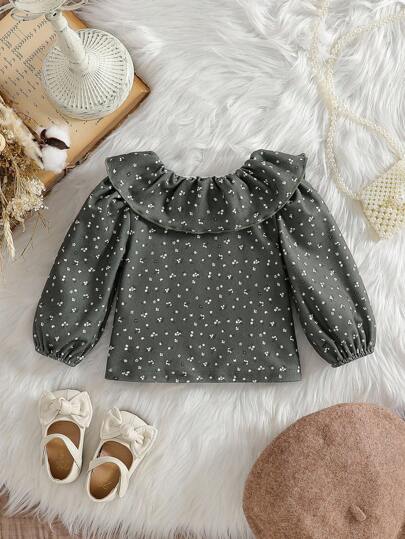 SHEIN Baby Girls' Floral Ruffled Collar Puff Sleeve Blouse. The Doll Collar And Round Neck Design Is Fashionable And Cute. Paired With The Puff Sleeves, The Style Is Both Retro And . Whether Taking Your Little One Out To Play Or Attending A Party, This Top Will Make Your Baby The Center Of Attention.