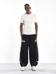 SUMWON Quần thể thao ống rộng Trendsetter dáng rộng in hình ngôi sao, sọc bên hông, dây rút, mặc dạo phố, mùa thu đông, đại học - màu đen - Xem 2