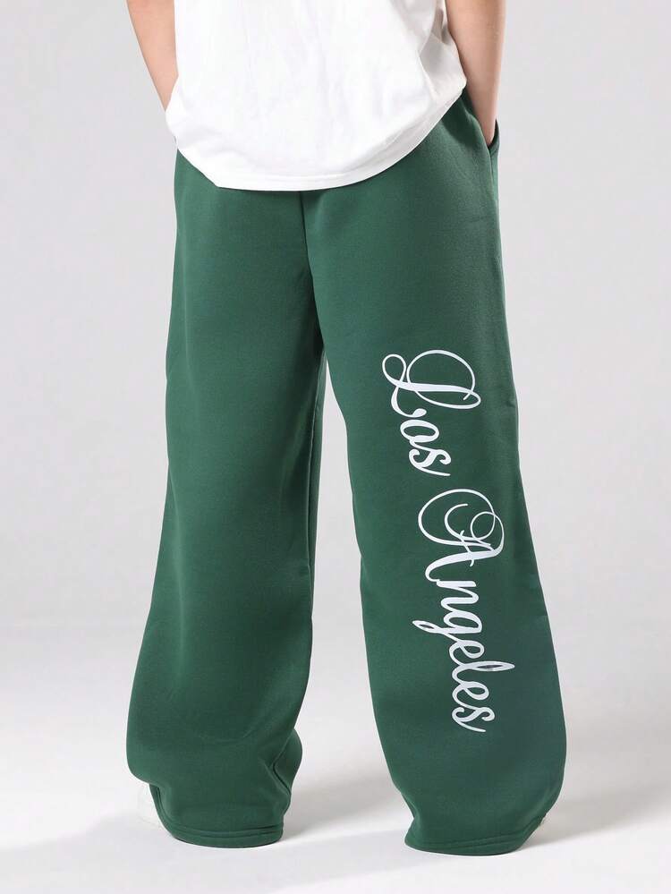 Pantaloni della tuta a gamba larga con tasche laterali e stampa scritta